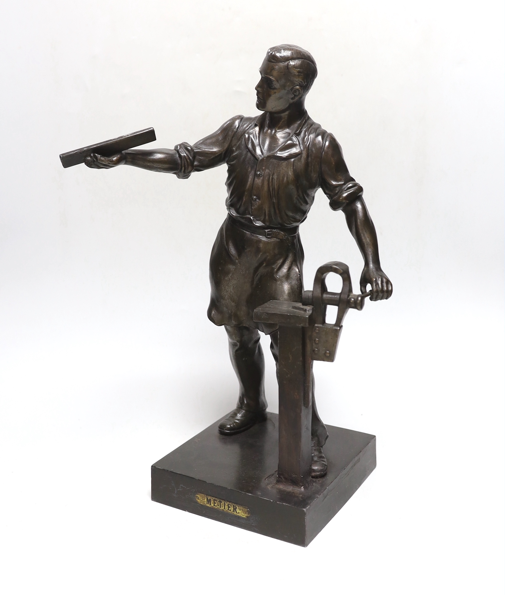 After Metier. A spelter figure of a workman, 40cm high